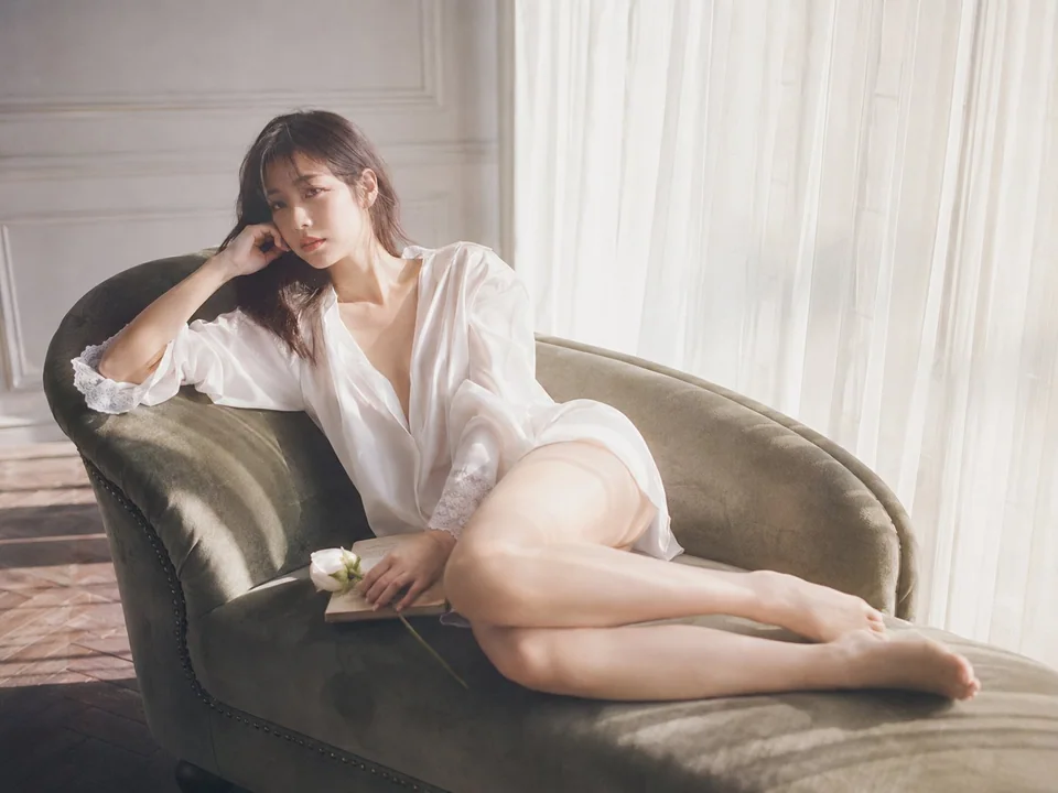 Sunlight, window side, velvet chair, portrait of an East Asian woman