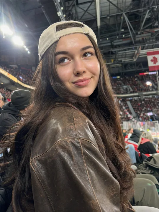 Stadium leather jacket baseball cap realistic girl