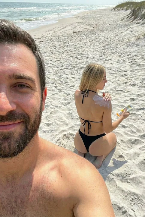 Boyfriend's perspective: golden-haired hot girl in a high-cut bikini, summer real selfie