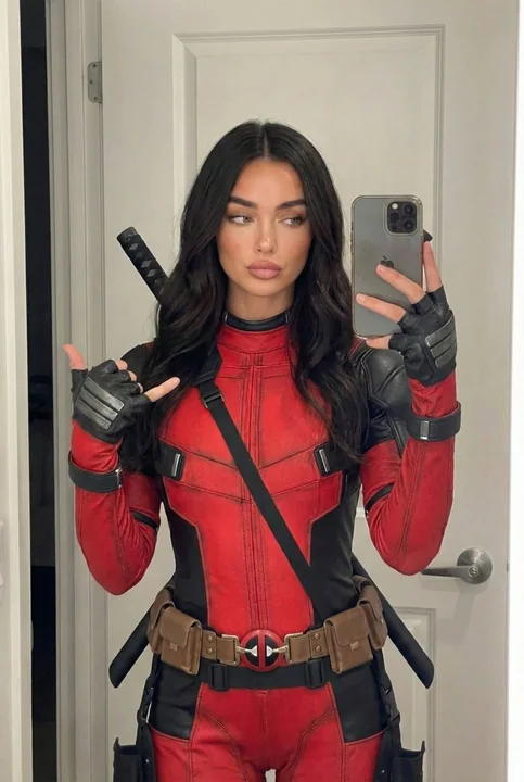 Cool and fierce Deadpool girl tight suit high detail mirror self-portrait