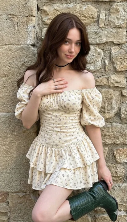 A lazy afternoon with a girl in a bohemian floral dress holding green boots