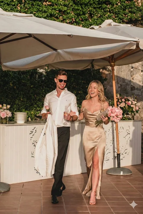 Romantic couple under a golden sunset: luxurious Mediterranean dinner