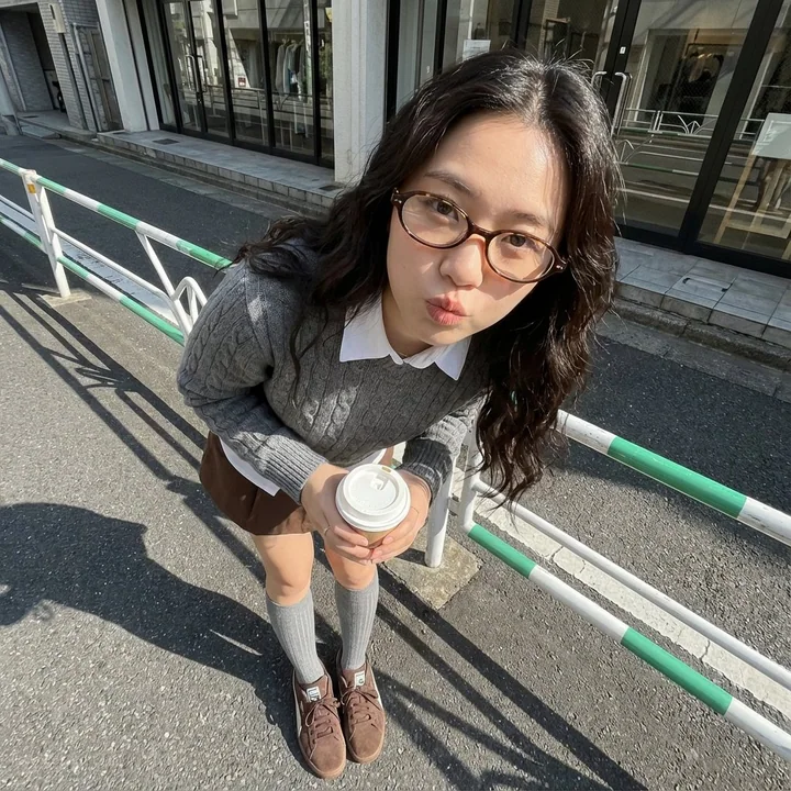In the sunlight, a sweet Korean-style academy girl holding a cup of coffee